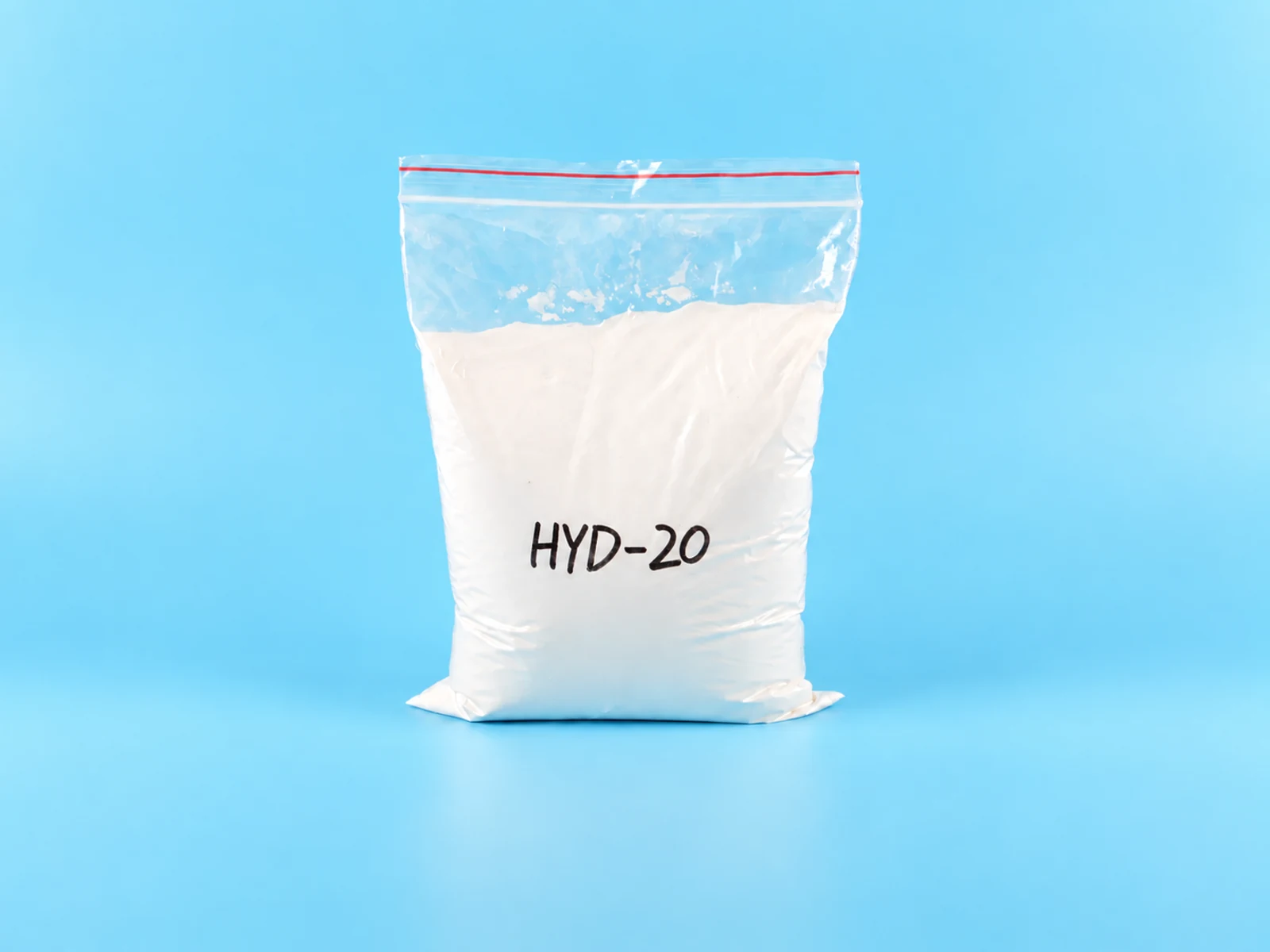 HYD-20 foaming aid powder sample in a laboratory dish
